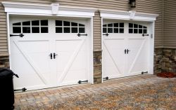 Steel carriage house garage doors
