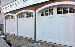 Custom wood garage doors with custom arches
