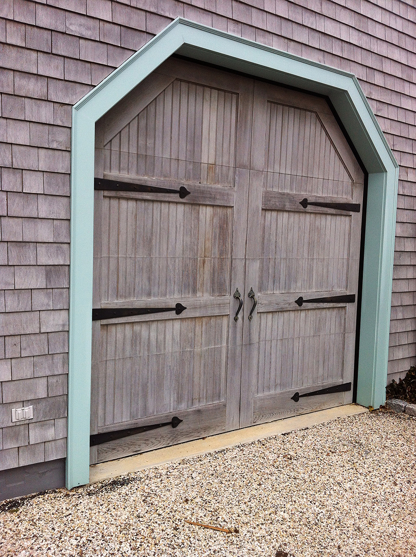 custom wood tongue and groove door with a un-finished cedar